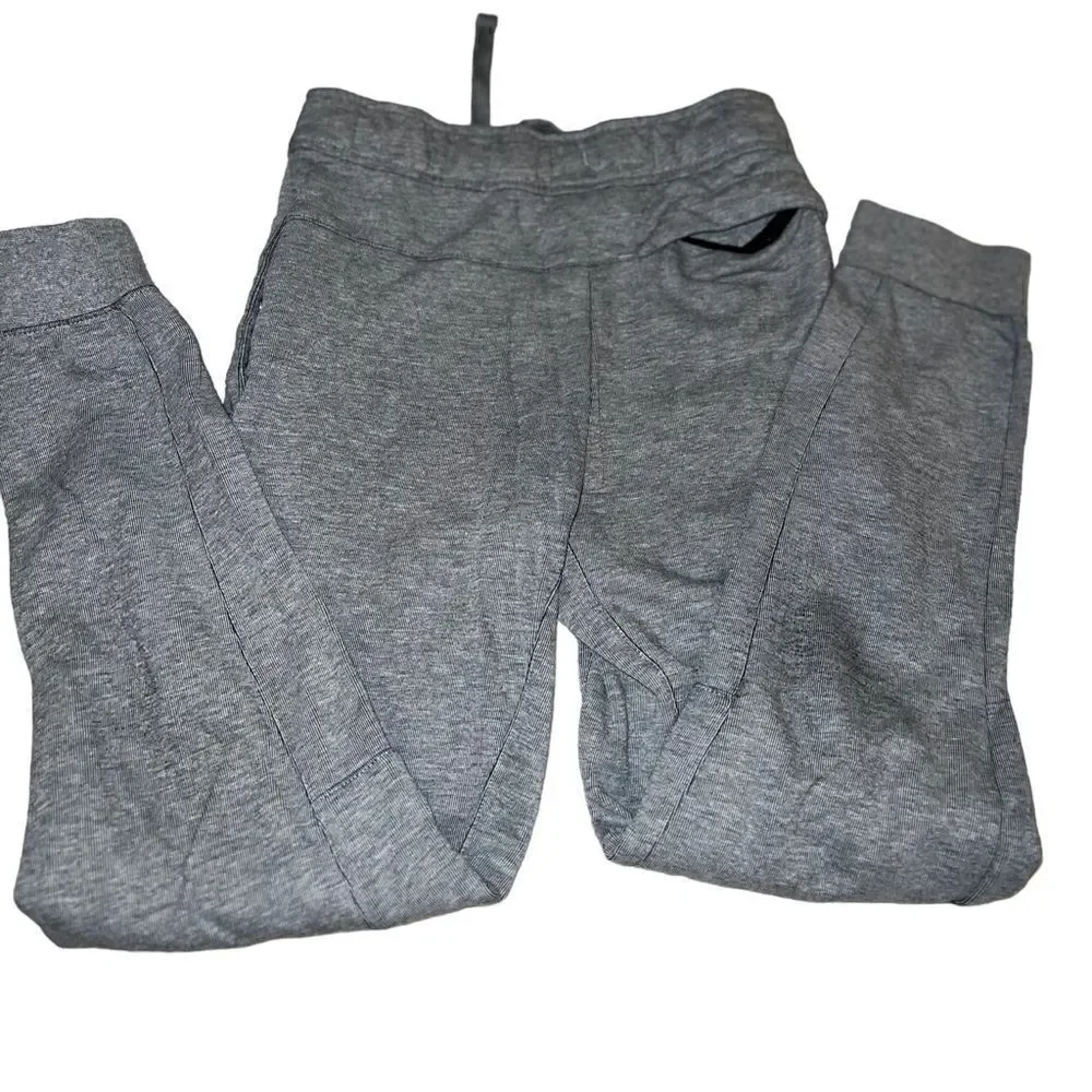 Nike grey joggers‎ with side pockets and back pocket youth size small